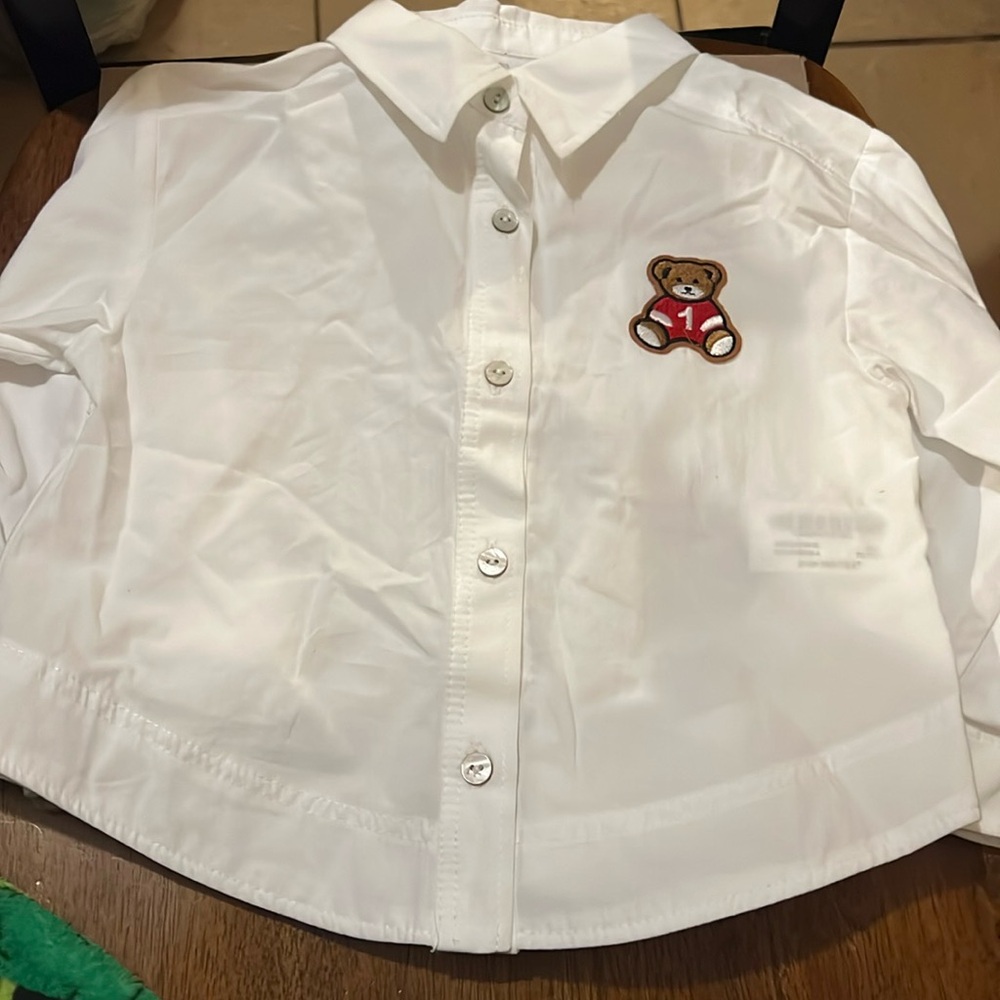 New outfit skinny jeans and a long sleeve button up with teddy bear